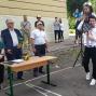 Свято з гірким присмаком війни: Буковинські міграційники привітали випускників підшефної школи з Днем останнього дзвоника